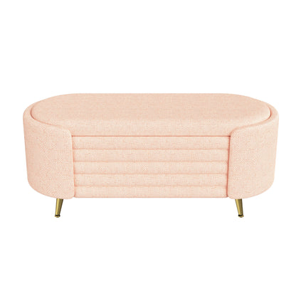 Pink modern oval storage ottoman with ribbed upholstered seat and gold legs