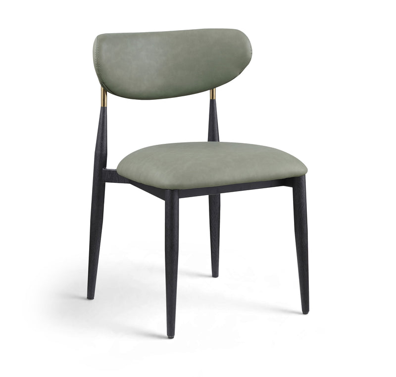 Green vegan leather dining side chair with padded seat, rounded back, black legs