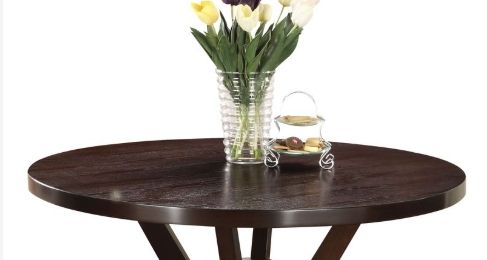 Dark espresso round dining table top with floral centerpiece