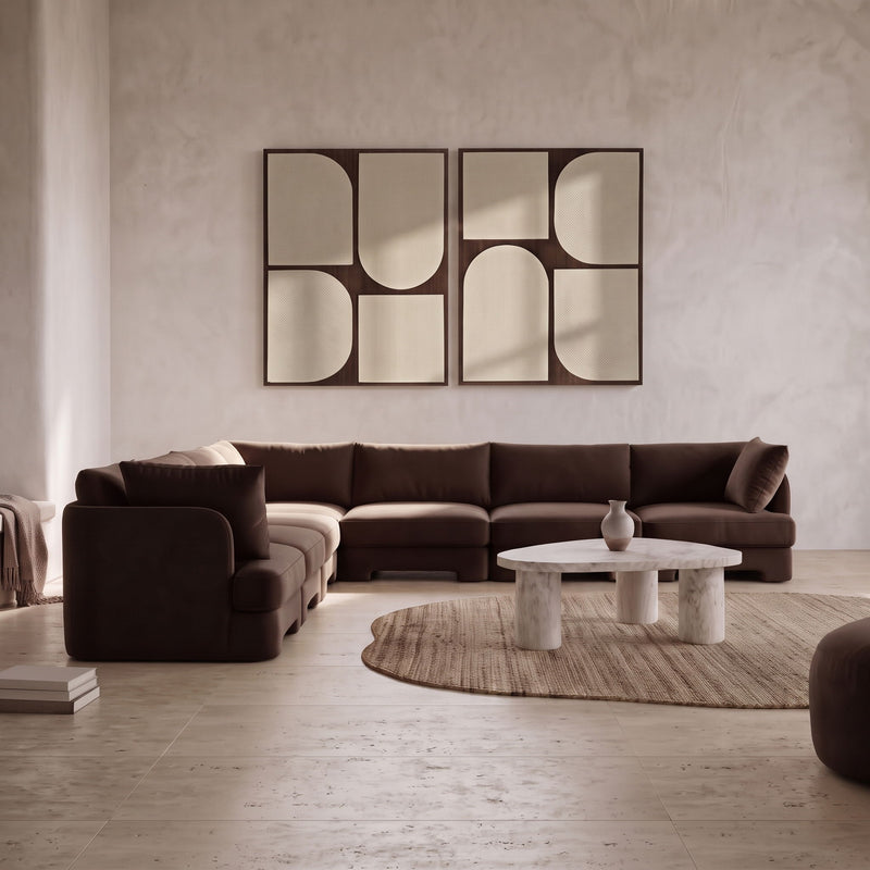 Dark brown velvet corner sectional sofa with tufted cushions and deep chaise seating