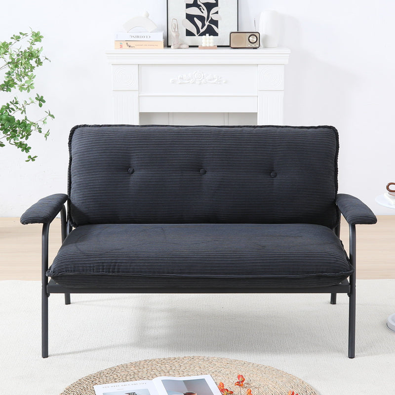 Navy metal frame sofa with striped upholstery and tufted back cushion