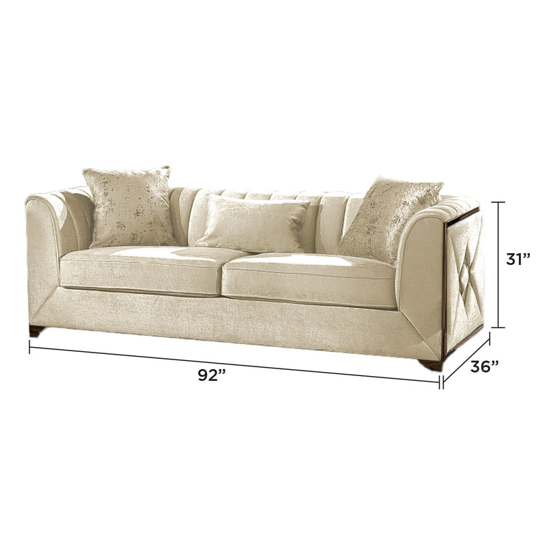 Beige fabric sofa with rolled arms, three seat cushions, and textured accent pillows
