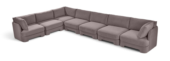 Velvet sectional sofa in gray with boxy arms and modular chaise seating