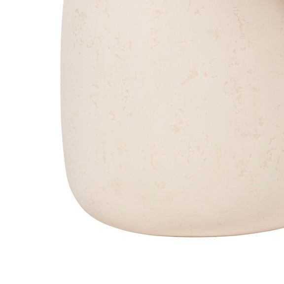 Rahul round coffee table close-up of cream tabletop edge with speckled texture