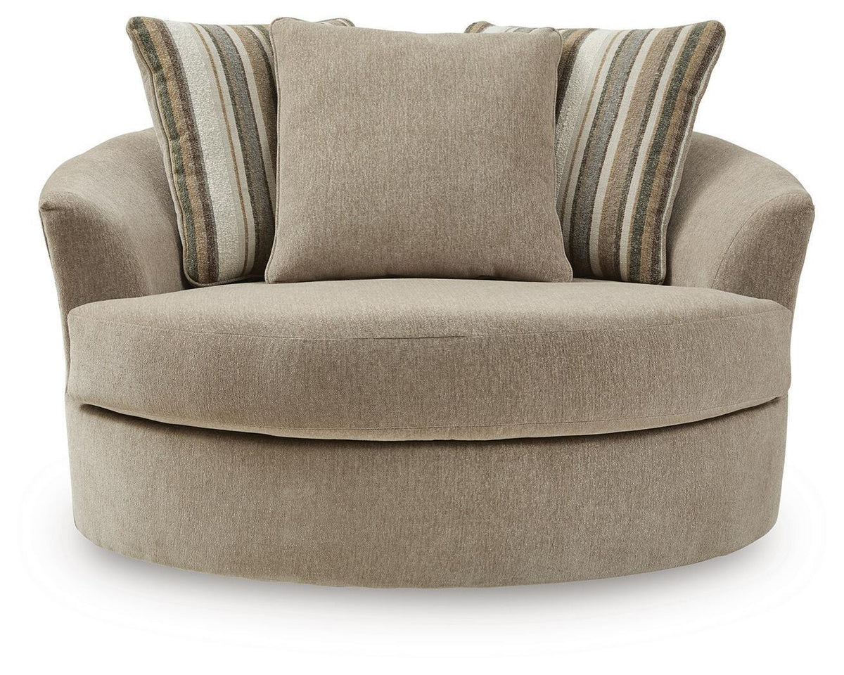 Oversized swivel accent chair in light beige fabric with two striped back cushions