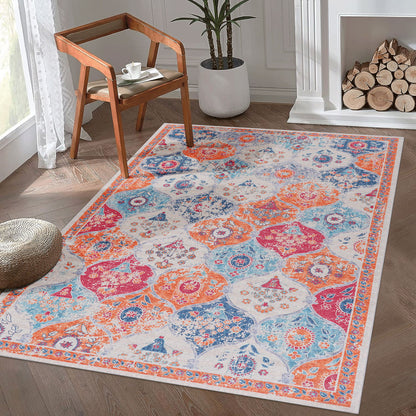 Orange and blue ornate area rug with distressed medallion pattern and detailed border