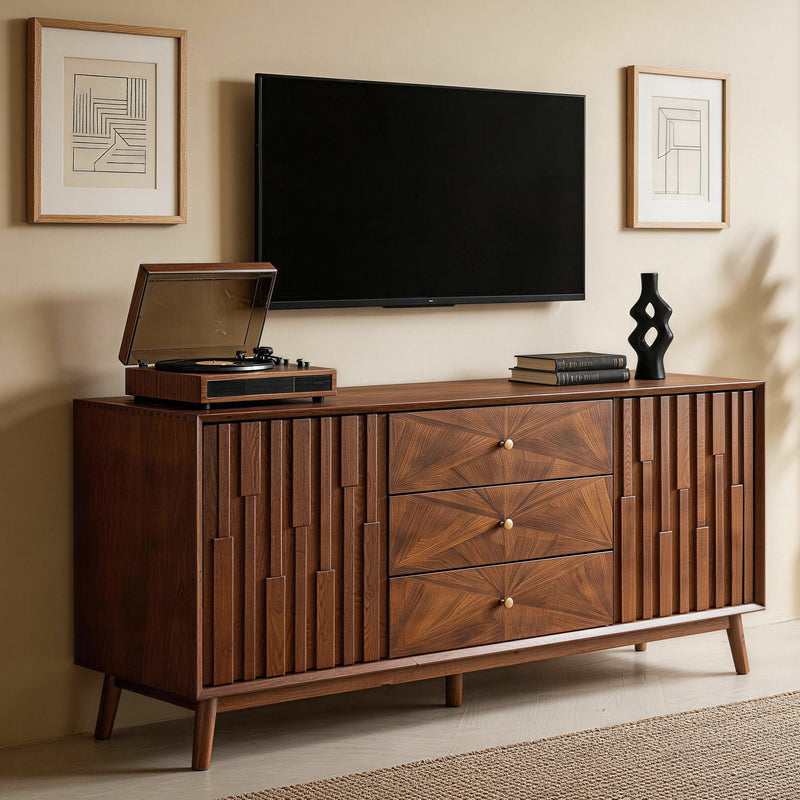 Walnut sideboard buffet cabinet with three drawers and decorative paneled doors, shown in a living room