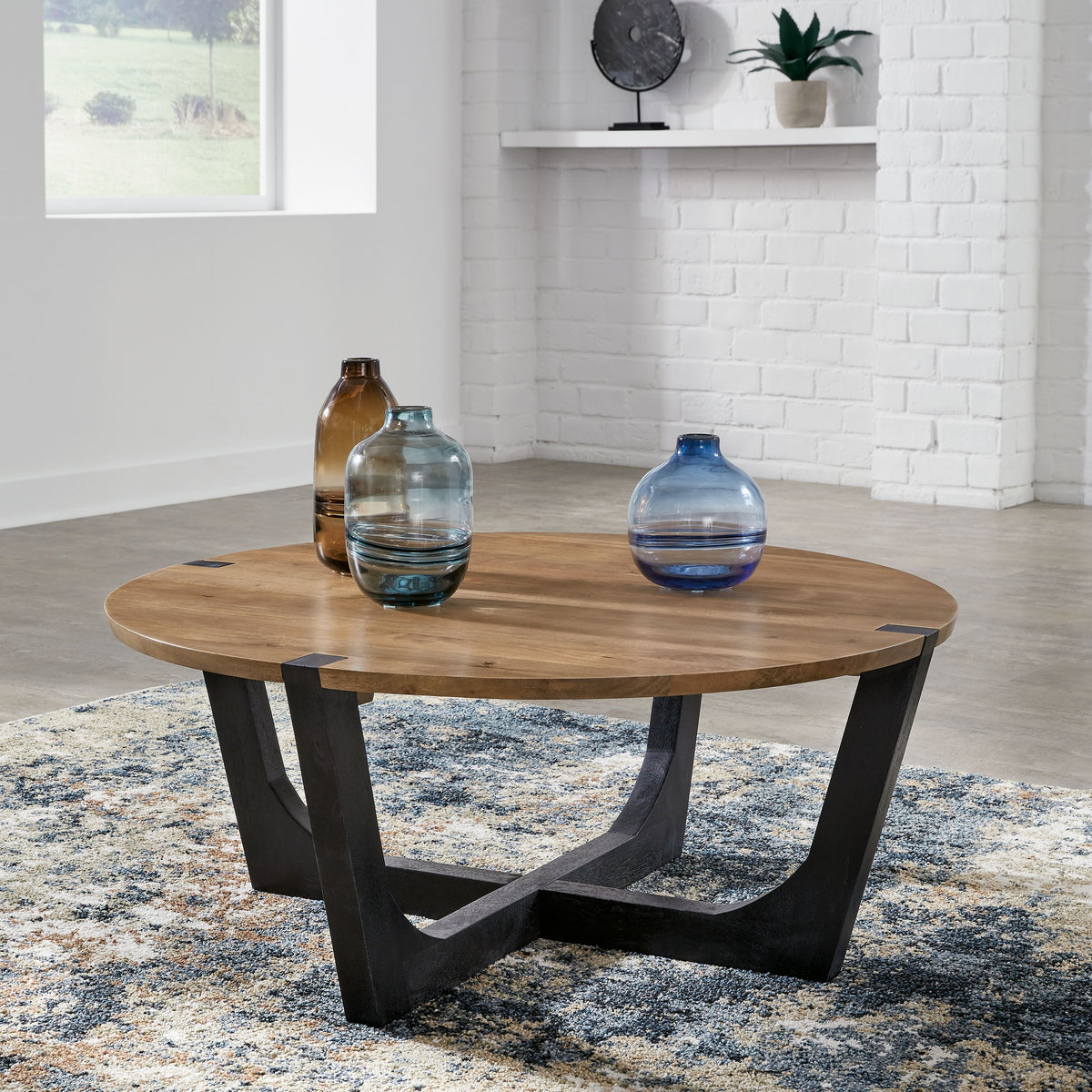 Hanneforth - Brown - Round Cocktail Table