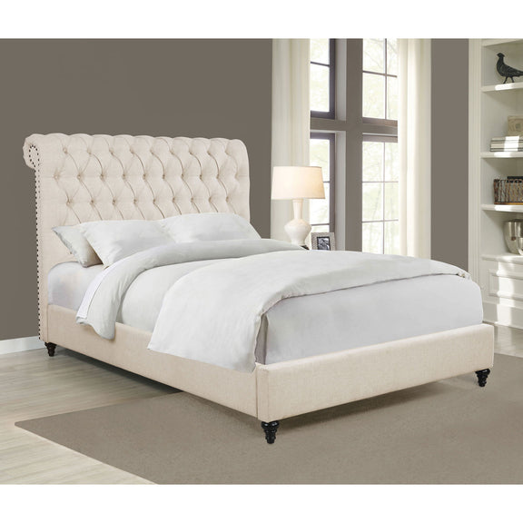 Beige tufted upholstered bed with rolled back headboard, fabric side rails, dark feet