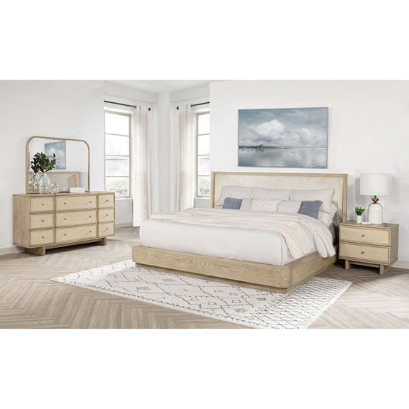Light brown platform bed with upholstered headboard and footboard