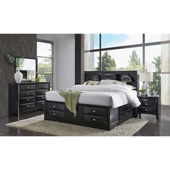 Black nightstand with three drawers and round silver pulls in bedroom setting