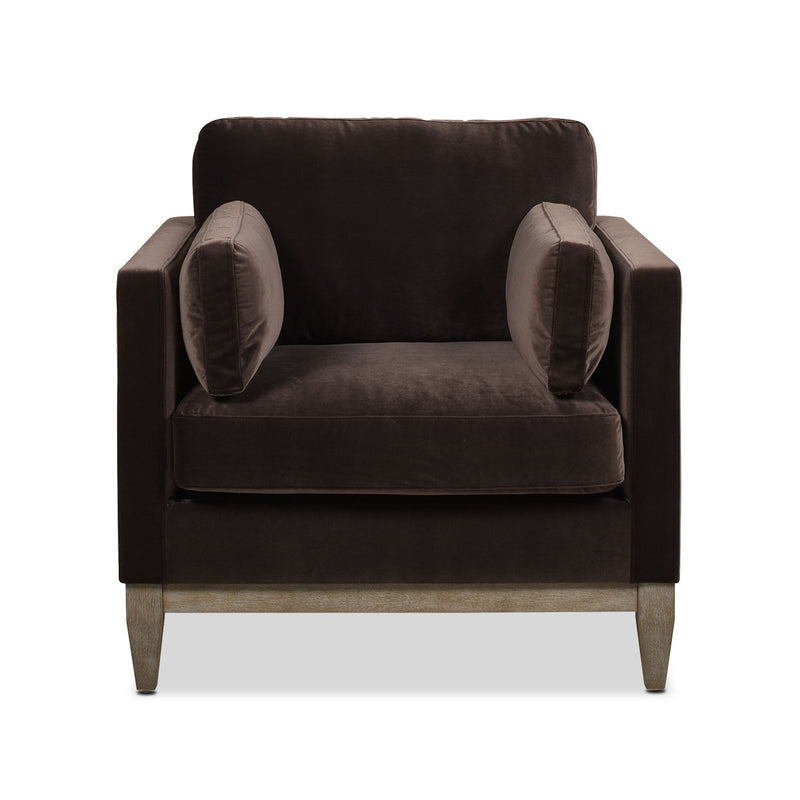 Dark upholstered armchair with padded back, rounded armrests, and light wood legs.