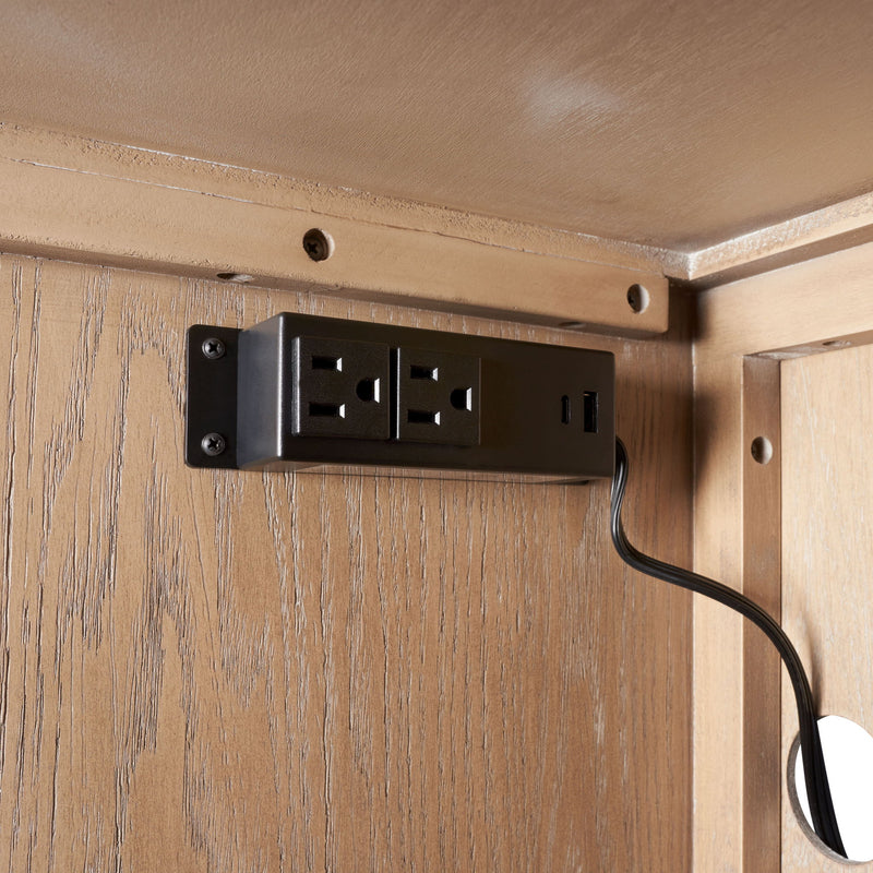 Wood cabinet power outlet module with black plate and cord opening