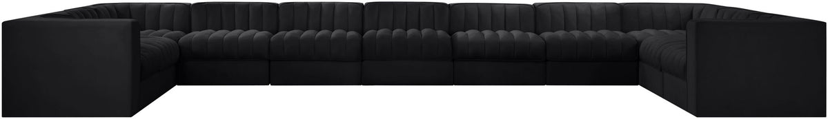 Velvet modular sectional sofa back view with tufted upholstery, black fabric, wide profile