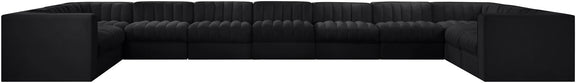 Velvet modular sectional sofa back view with tufted upholstery, black fabric, wide profile