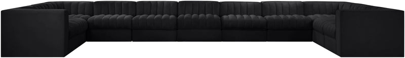Velvet modular sectional sofa back view with tufted upholstery, black fabric, wide profile