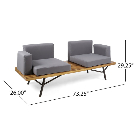Two-seat patio loveseat with gray cushions and natural wood coffee table base.