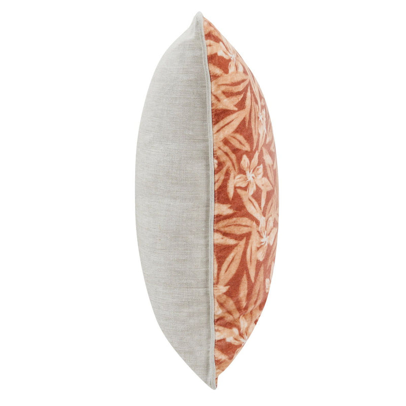 Square throw pillow showing side seam: rust floral front with beige back, 22x22 in