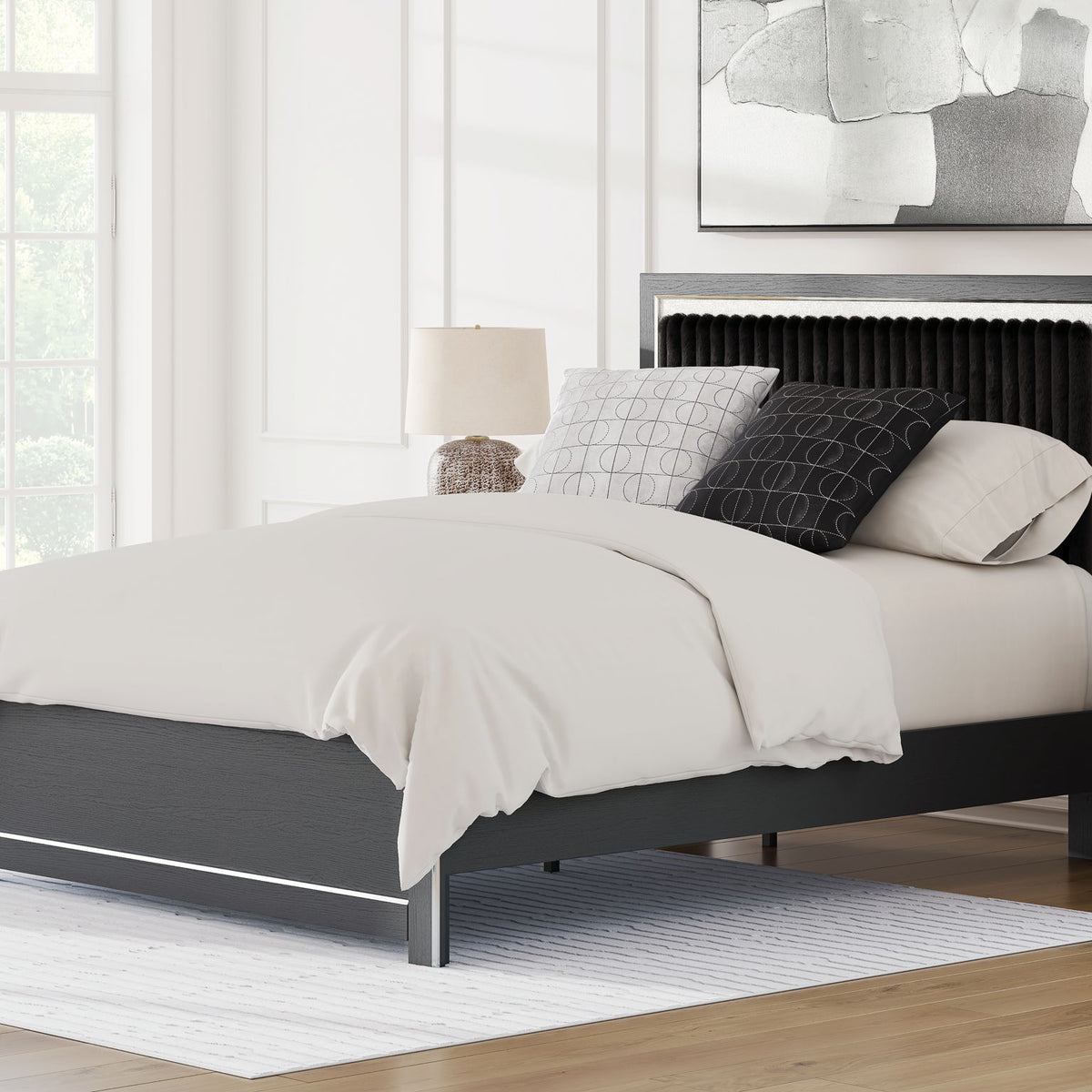 Upholstered platform bed with roll slats, dark frame and black upholstered headboard