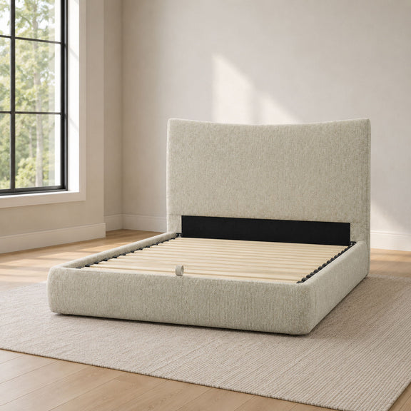 Beige upholstered bed with tall headboard and lift-up storage, slatted base