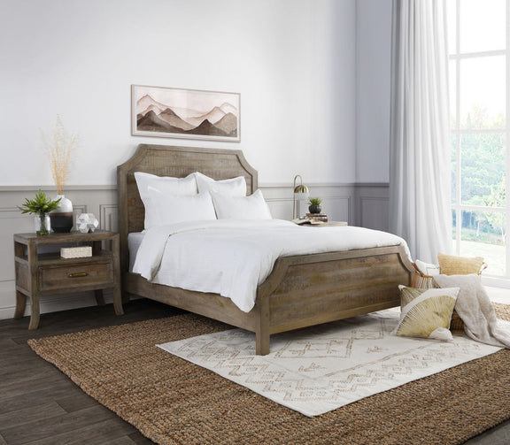 White pillow shams on bed with textured woven fabric