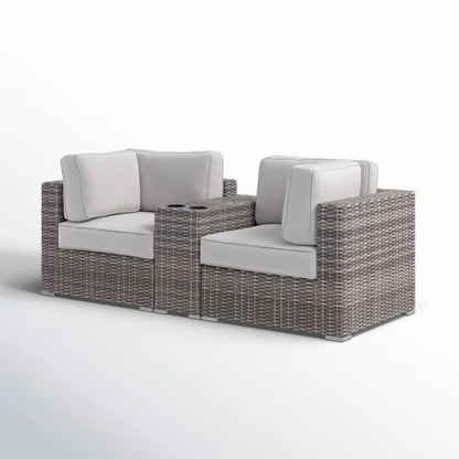 Outdoor wicker loveseat with gray seat and back cushions, two-seat design