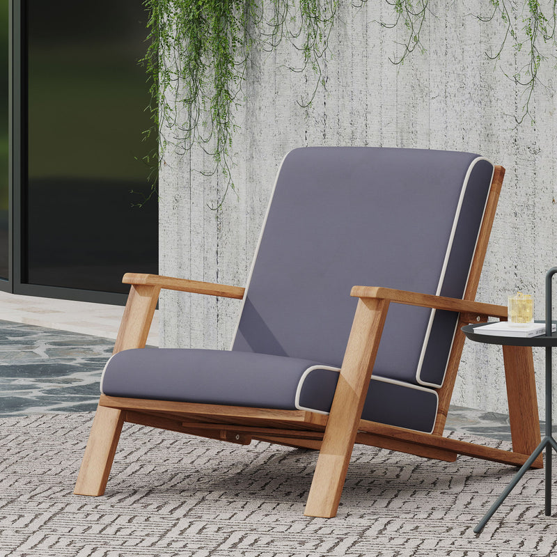 Dark gray outdoor lounge chair with padded seat and back, light wood armrests