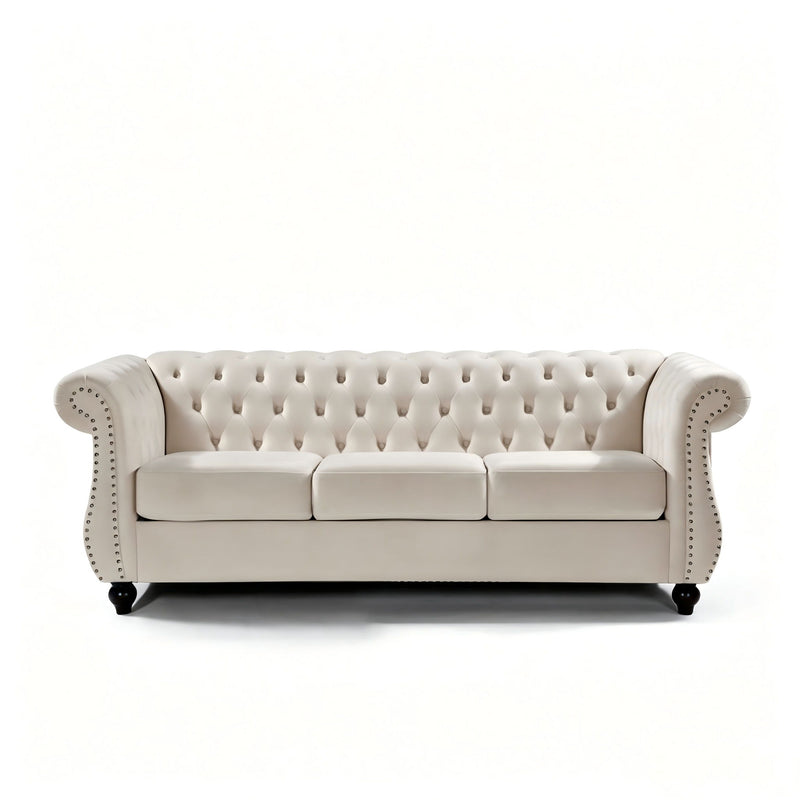 Beige three-seat button-tufted sofa with rolled arms and nail-trimmed edges