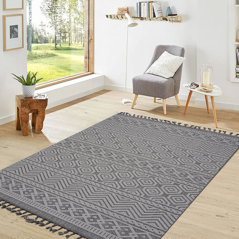 Geometric area rug in gray and white with border and fringed edges, 8x10 ft