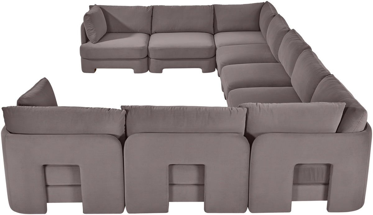 Gray velvet performance fabric sectional sofa section with tufted seat cushions and arm panels