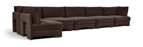 Dark brown L-shaped armless sectional sofa with velvet-style upholstery and tufted back cushions