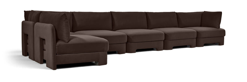 Dark brown L-shaped armless sectional sofa with velvet-style upholstery and tufted back cushions