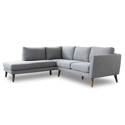 Light gray sectional sofa with chaise, squared arms and angled chaise platform