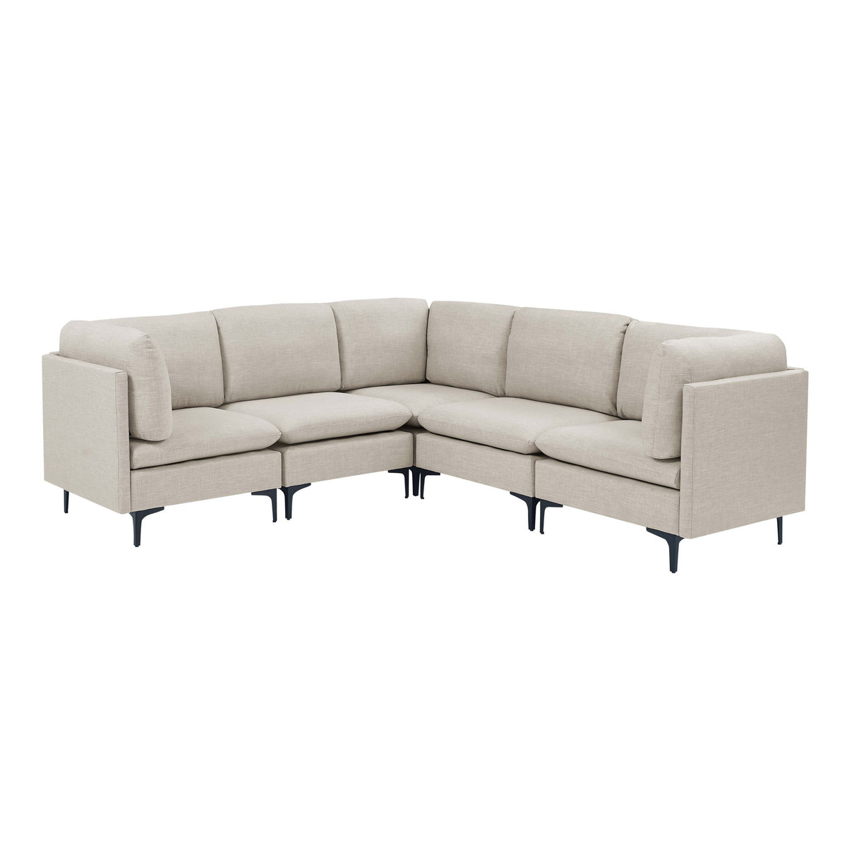 Beige modular sectional sofa with tall dark legs and angled corner layout