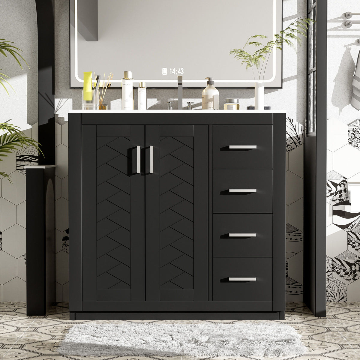 Black bathroom vanity with two doors, three drawers, and gold bar pulls in a bathroom setup