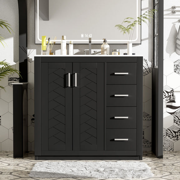 Black bathroom vanity with two doors, three drawers, and gold bar pulls in a bathroom setup