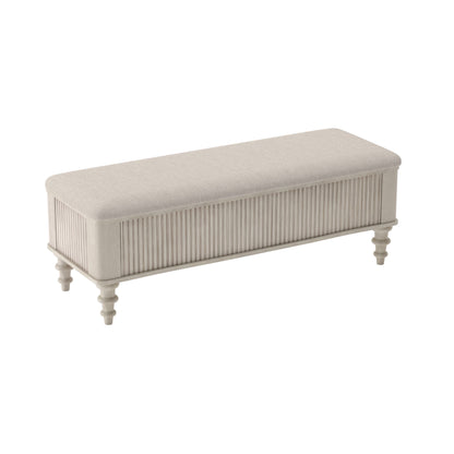 Storage ottoman bench with beige upholstered top and vertical ribbed frame, tapered legs.