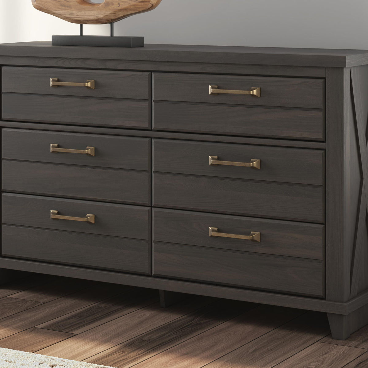 Dark brown six-drawer dresser with brass-tone pulls and X-braced side panels