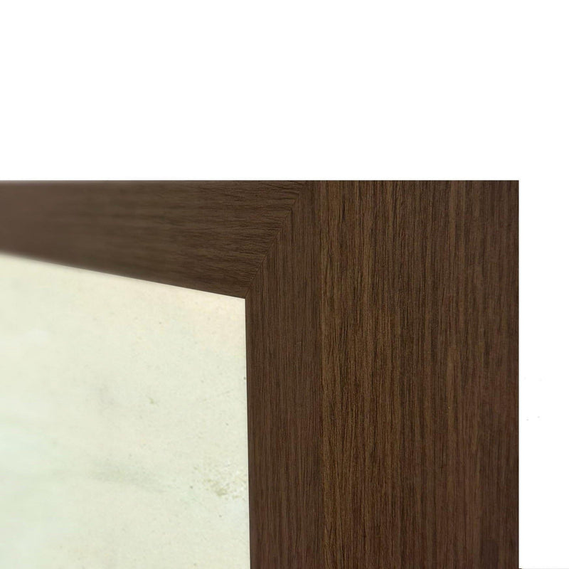 Brown wood picture frame corner with visible grain beside the tree artwork border