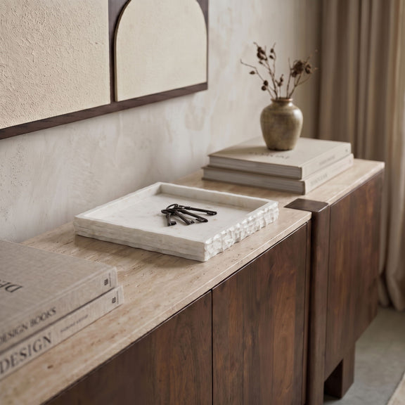 Genuine marble tray on a console with rectangular rim and warm tan veined stone.