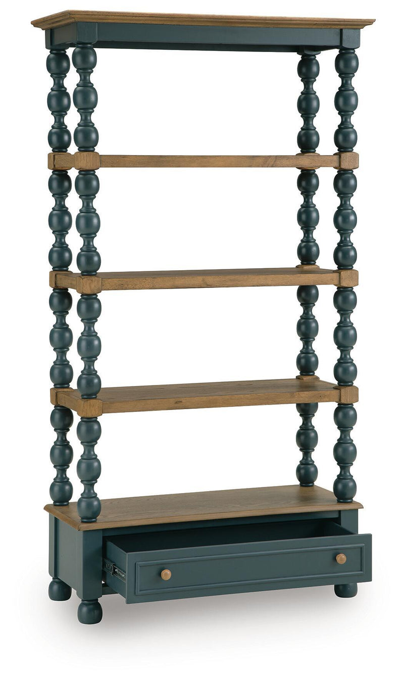 Blue bookcase with three wood shelves, dark turned posts, and a single lower drawer