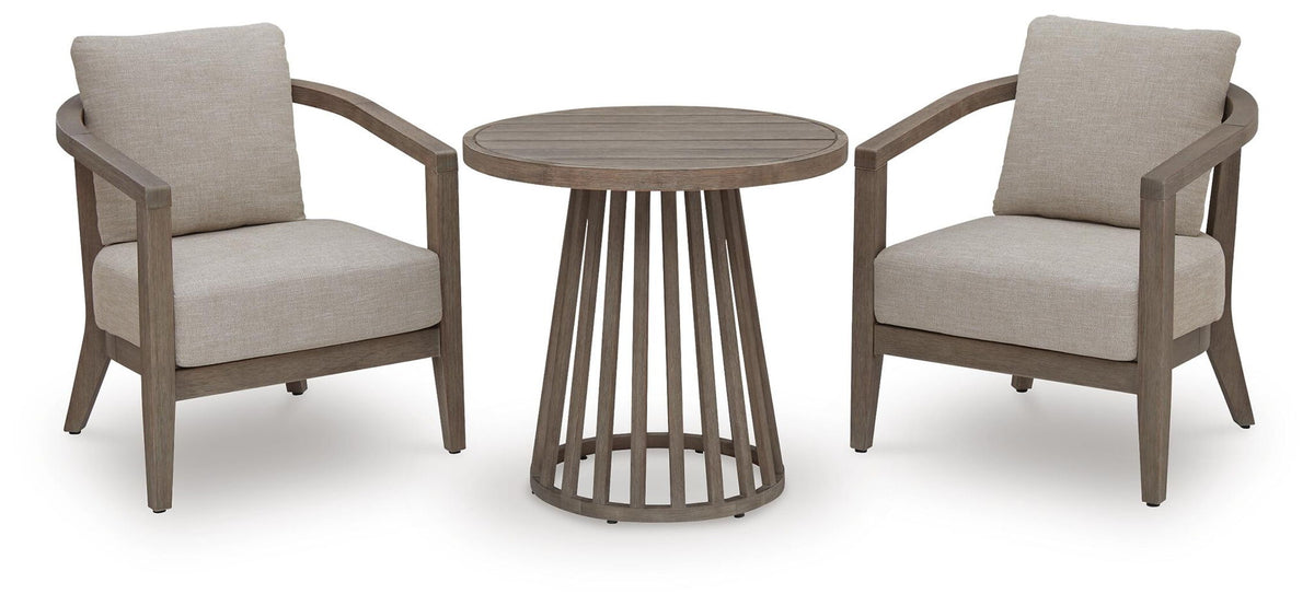 Outdoor patio set with two beige armchairs and round slatted side table with cushions