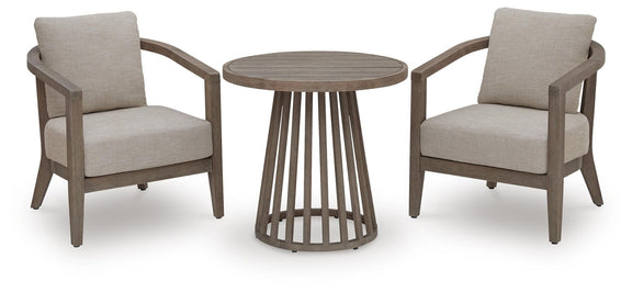 Outdoor patio set with two beige armchairs and round slatted side table with cushions