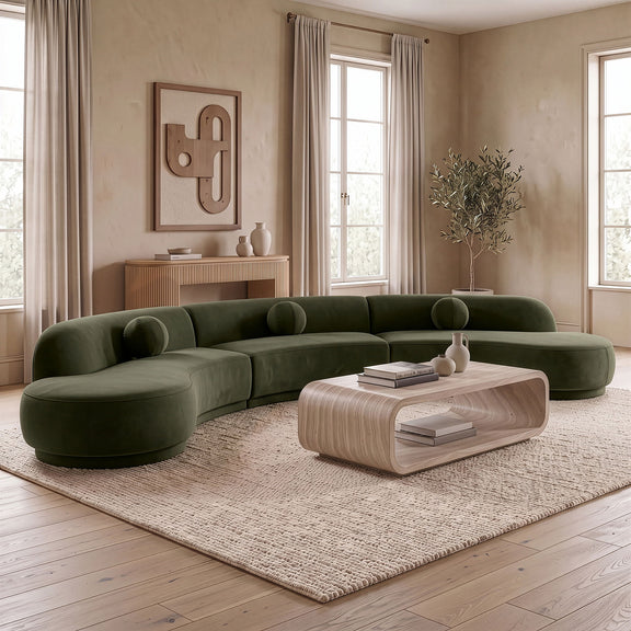 Olive green velvet sectional with rounded chaise and deep cushioned seats