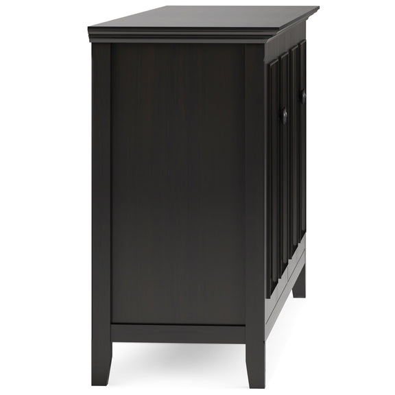 Side view of the dark brown storage cabinet, showing its solid side panel and raised top