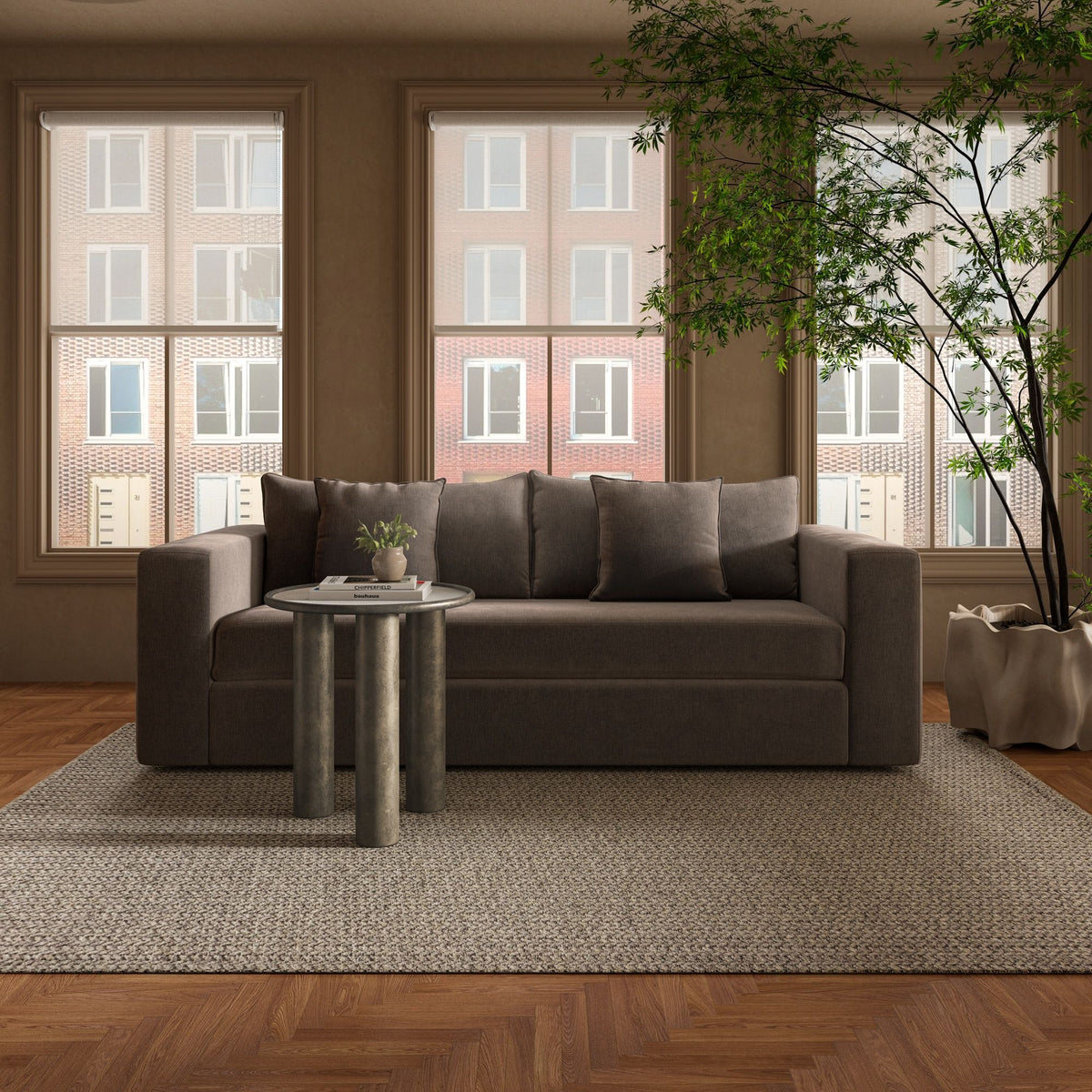 Warm charcoal sleeper sofa with padded back cushions and square arm sections.