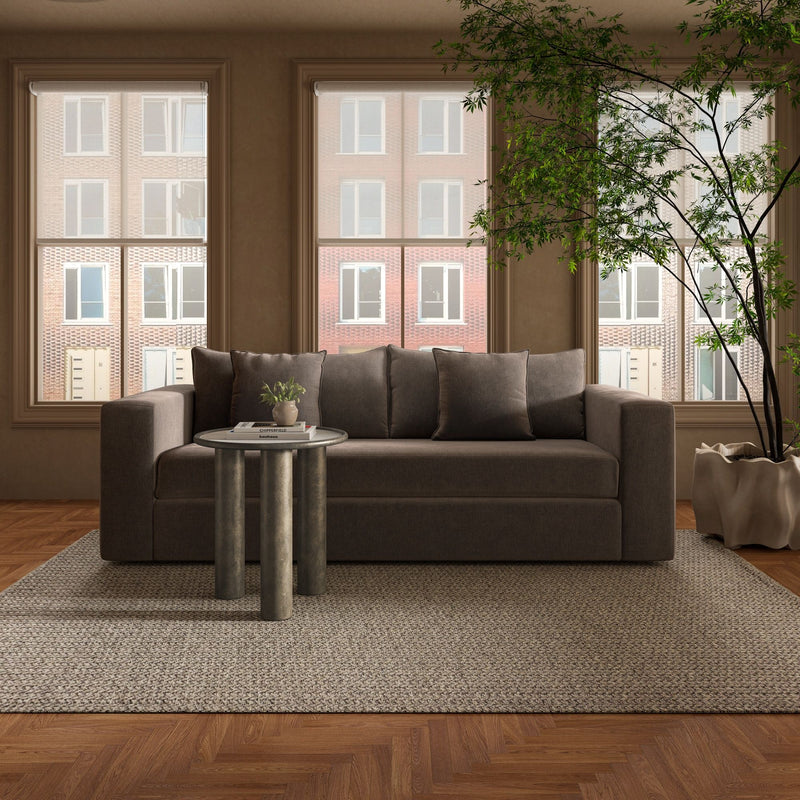 Warm charcoal sleeper sofa with padded back cushions and square arm sections.