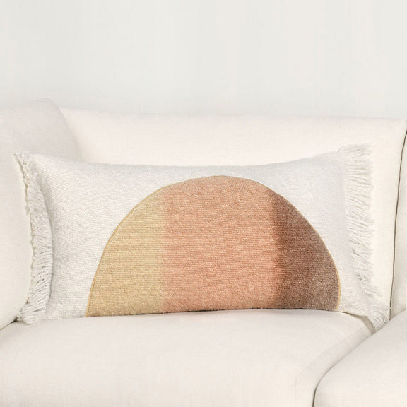 Ivory pillow with textured arched yellow insert and white fringe edges