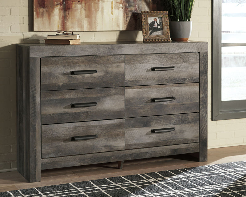 Gray dresser with four drawers on each side and central cabinet doors