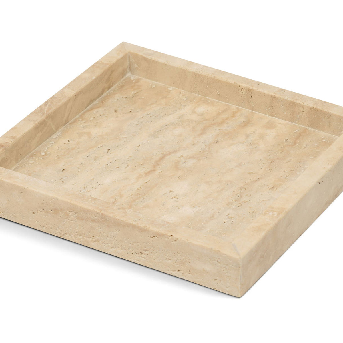 Beige travertine tray with shallow recessed center and speckled stone texture
